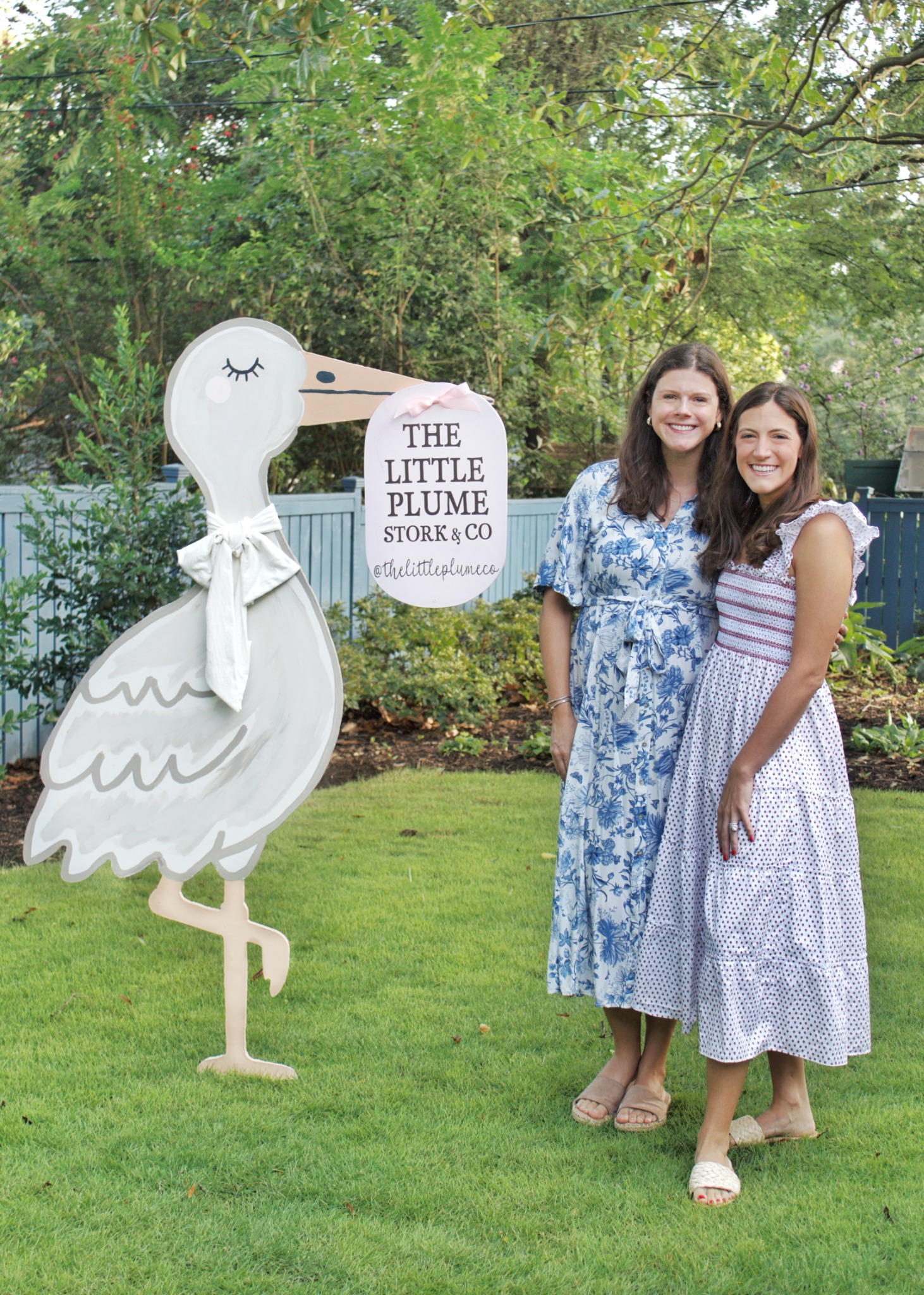 The Little Plume founders with their stork