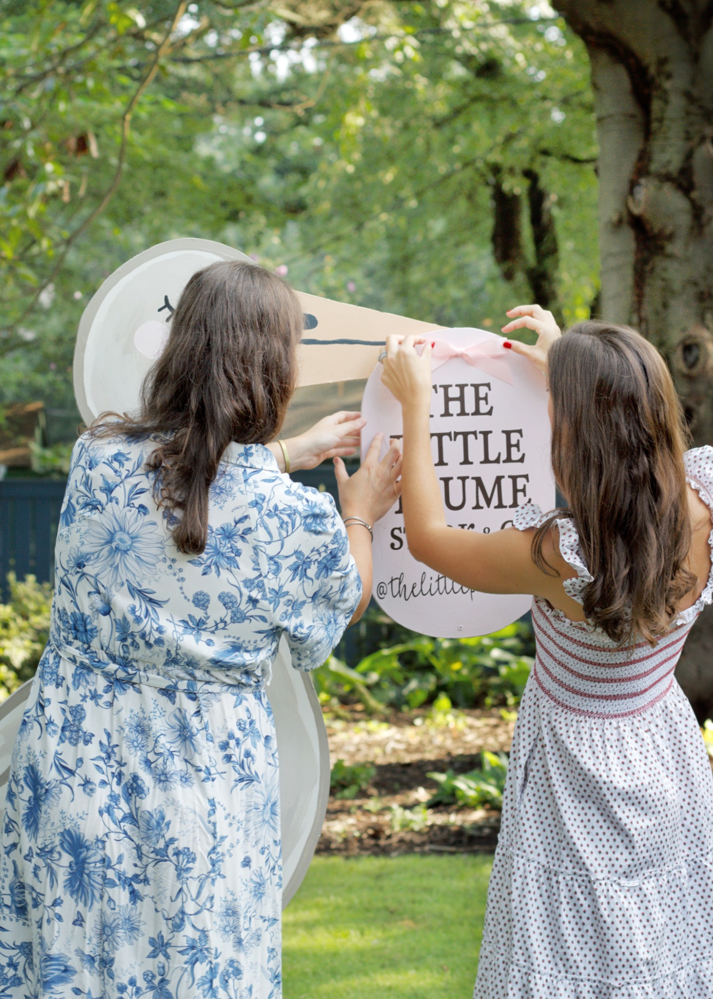 The Little Plume founders beside their stork